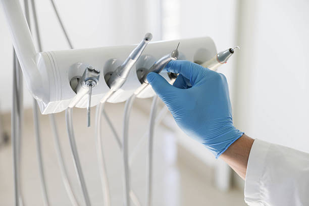 Professional Emergency Dentist technician working in Howell, MI